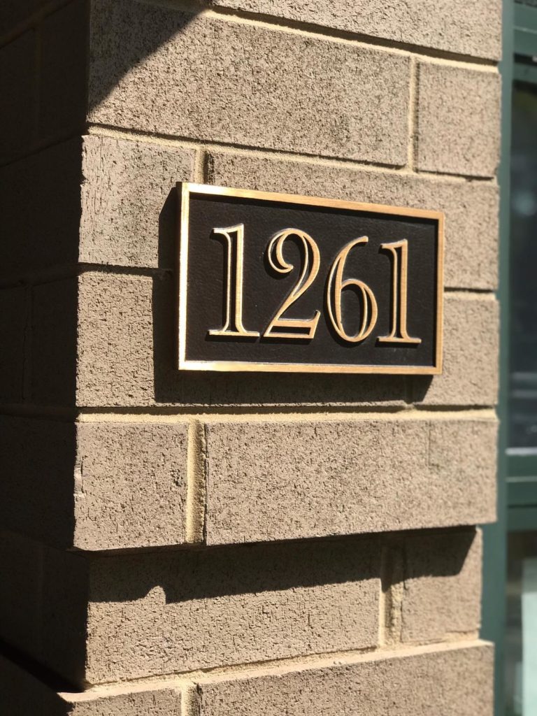 Bronze address plaque exterior signage NYC