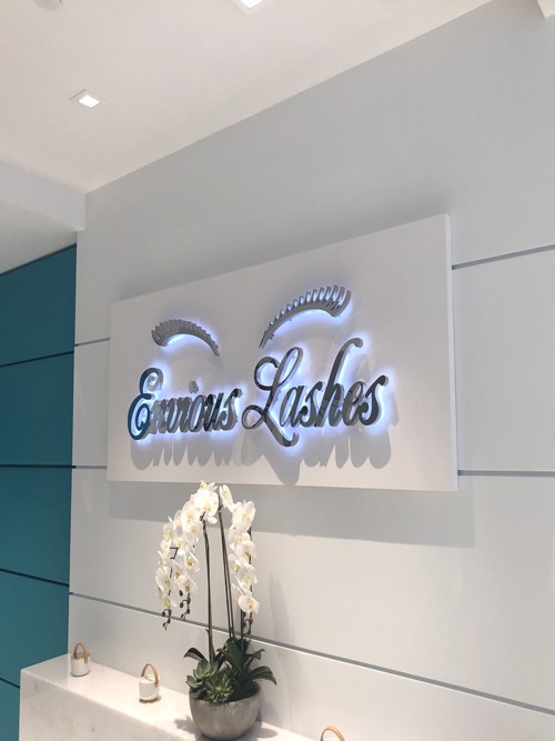 Backlit reception signage with halo-lit letters NYC