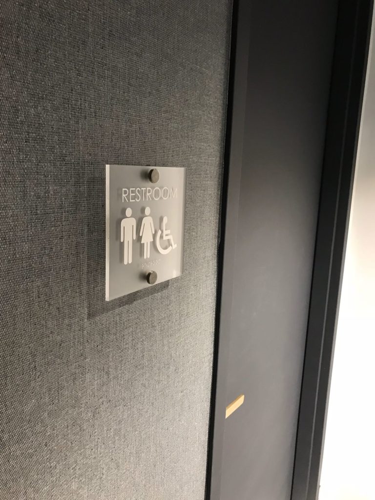 Glass door ADA signage